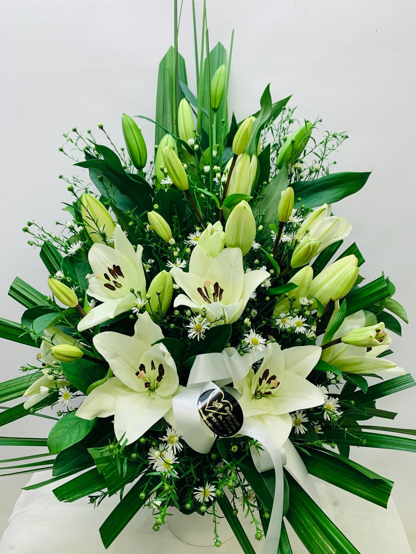 flower arrangements with white lilies White Lily Arrangement – Sweetheart Florist